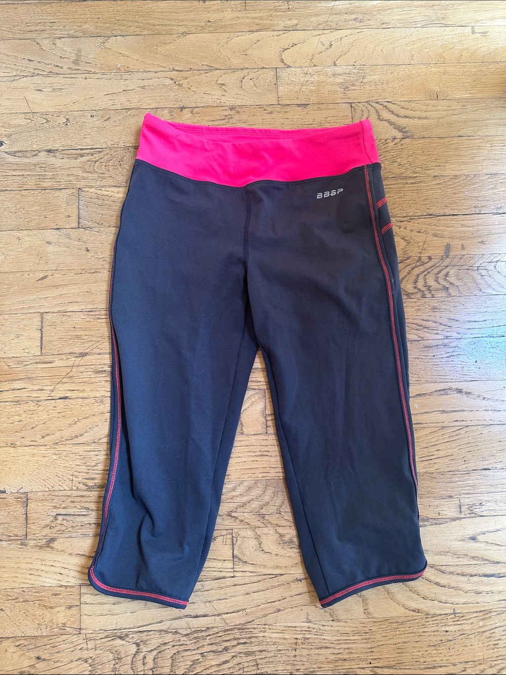 bebe Black Capri Leggings with Hot Pink Waistband
